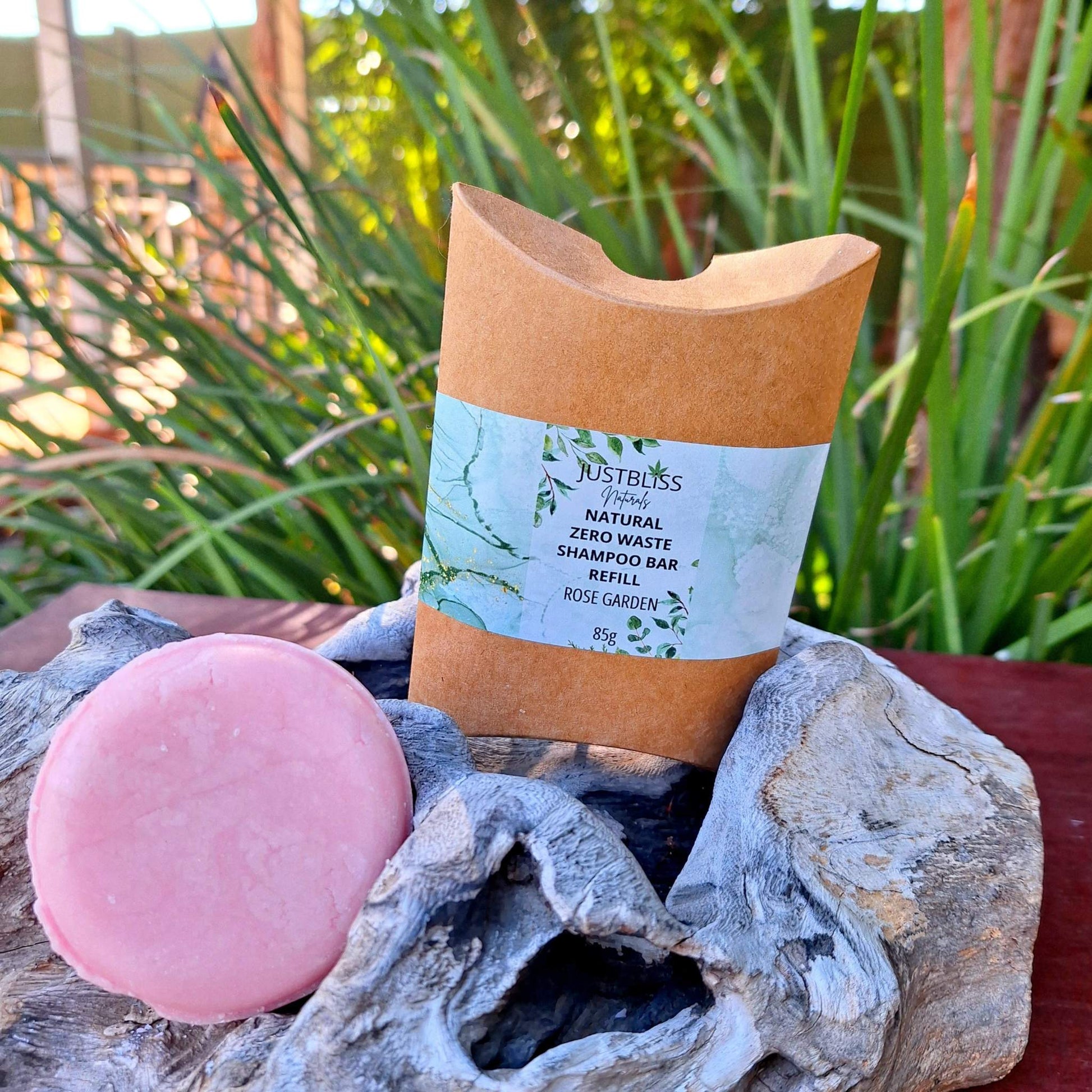 Eco-friendly Shampoo Bar Refill in kraft packaging on natural background.