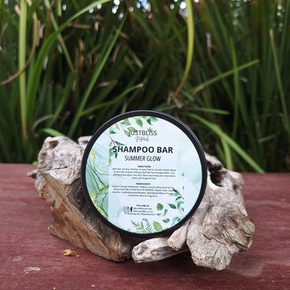 Eco-friendly Shampoo Bar in reusable tin for all hair types, featuring plant-based ingredients like Hemp Seed and Prickly Pear oils for hydration and strength.