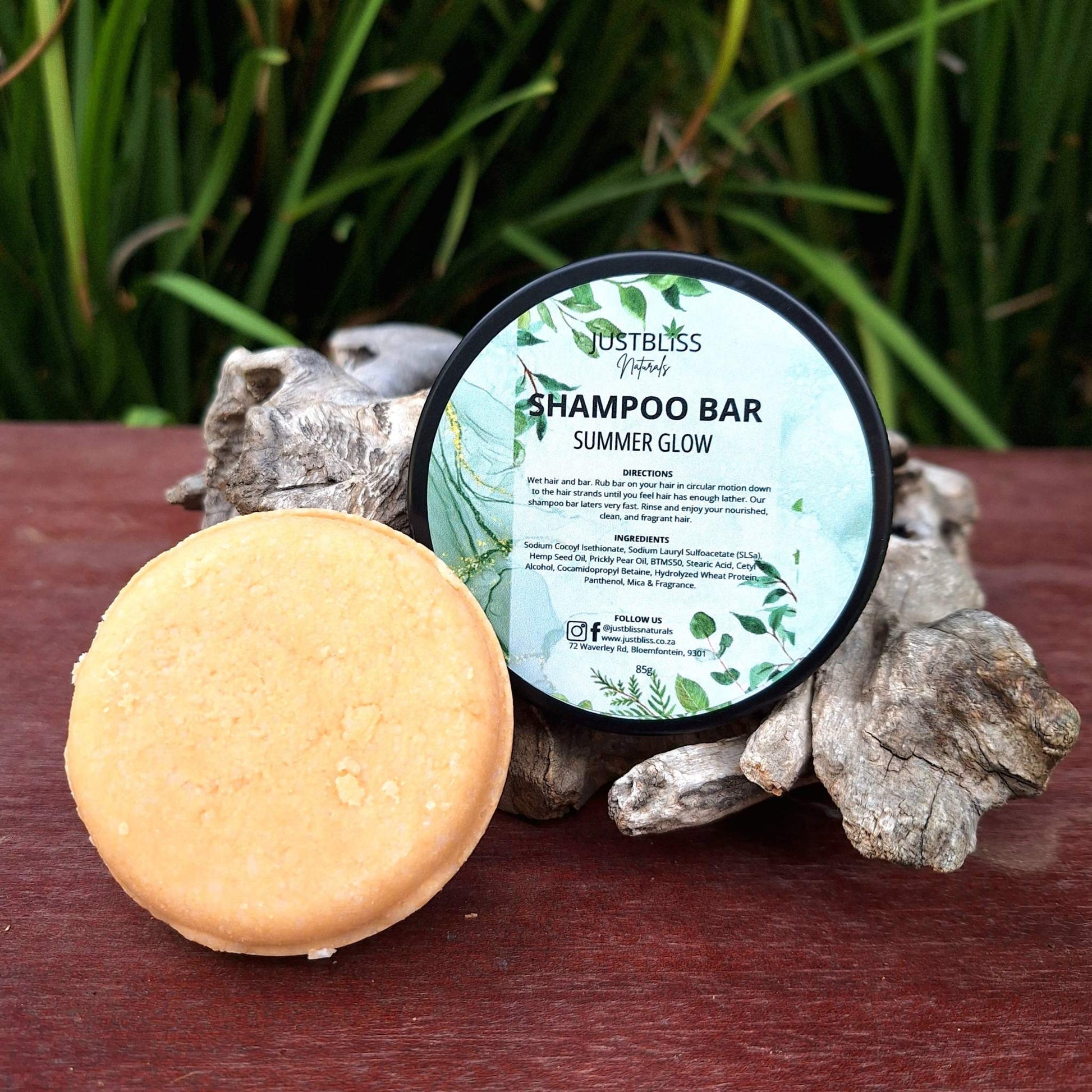 Eco-friendly Shampoo Bar in reusable tin with plant-based ingredients for all hair types.