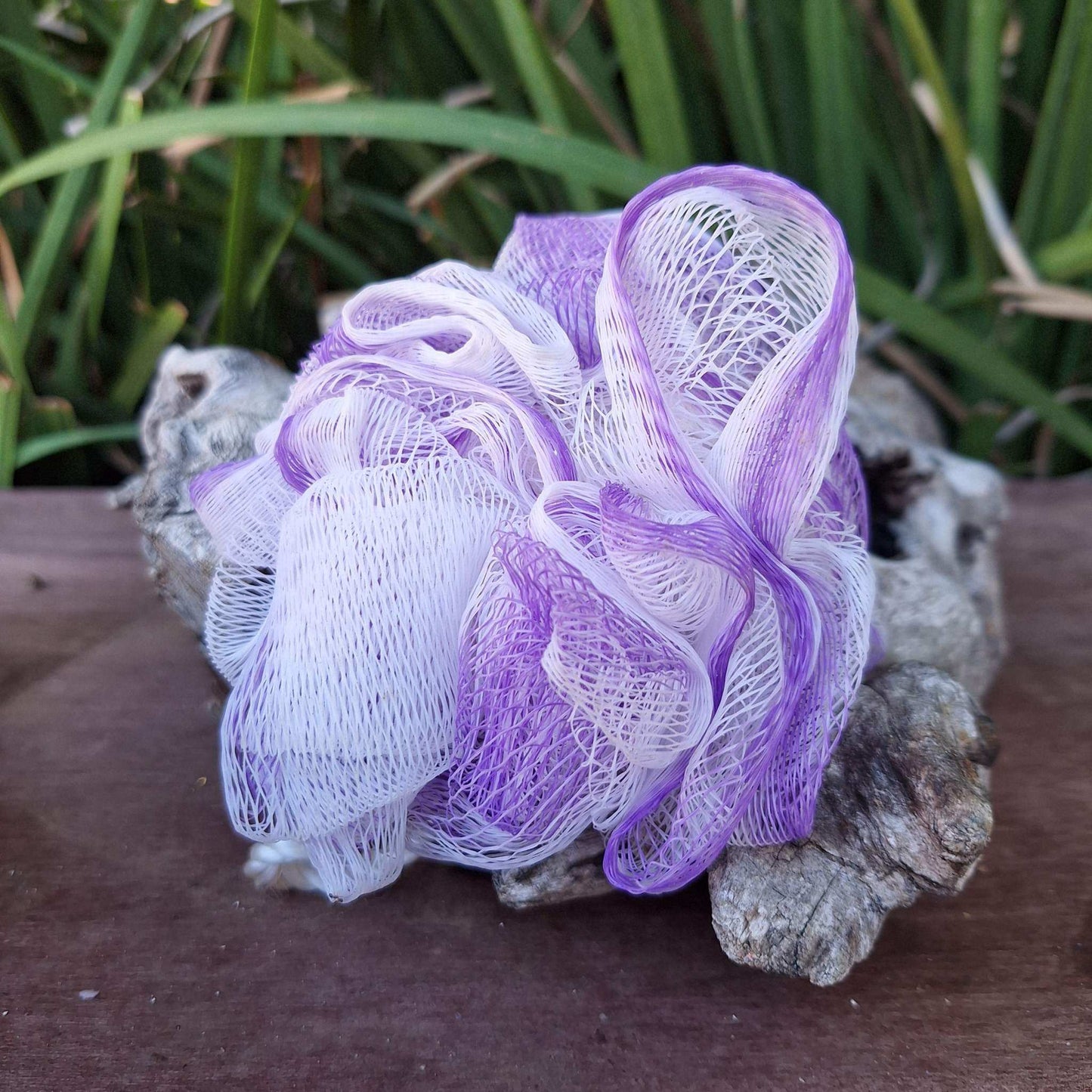 Purple & white bath & shower assorted scrunchies for exfoliating and cleansing.