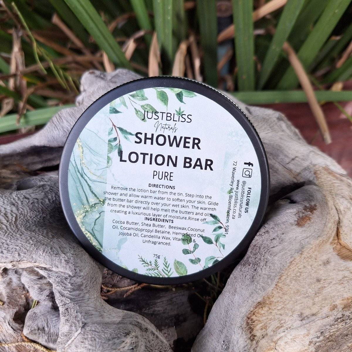 Pure Shower Lotion Bar on natural background, providing deep hydration with cocoa butter, shea butter, and nourishing oils.