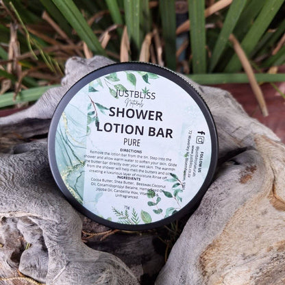 Pure Shower Lotion Bar on natural background, providing deep hydration with cocoa butter, shea butter, and nourishing oils.