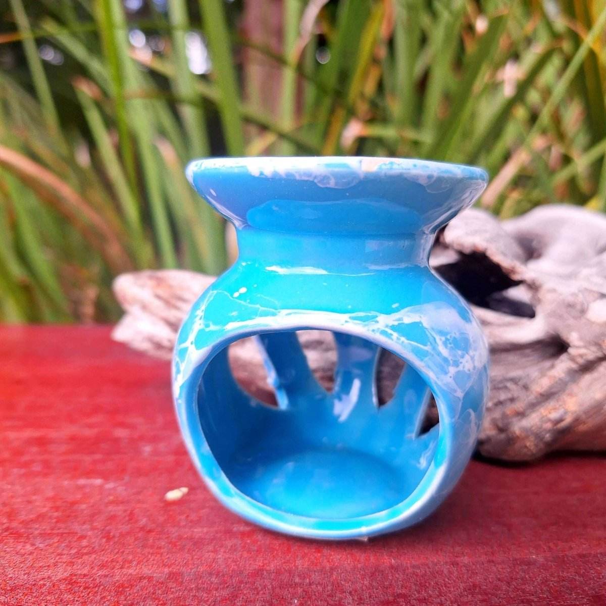 Blue essential oil burner included in Aromatherapy Box 1 gift set.