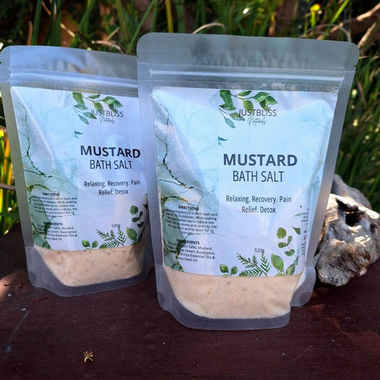 Mustard Bath Salt for Detox and Circulation with essential oils in natural setting.