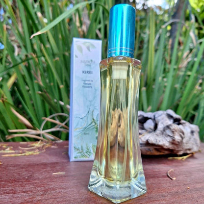 Floral Perfume bottle of Kirei, 50ml, displayed outdoors.